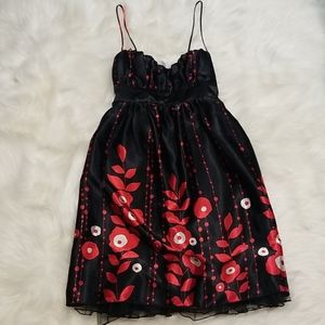 Black dress with red flowers.